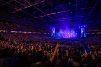 Modern Indoor Arena Live Concert with Vibrant Lighting
