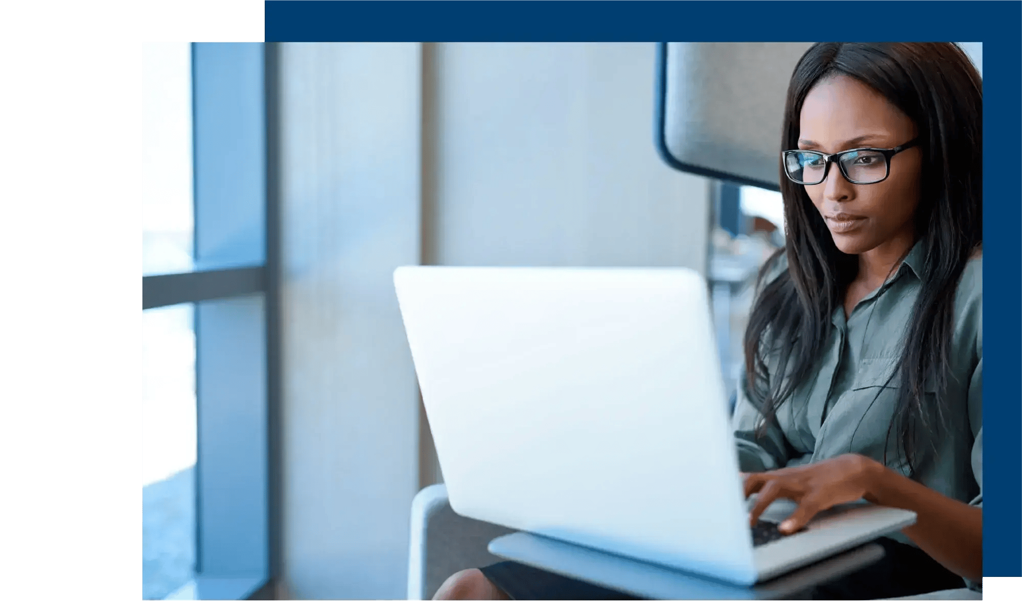 Task management executive using a laptop