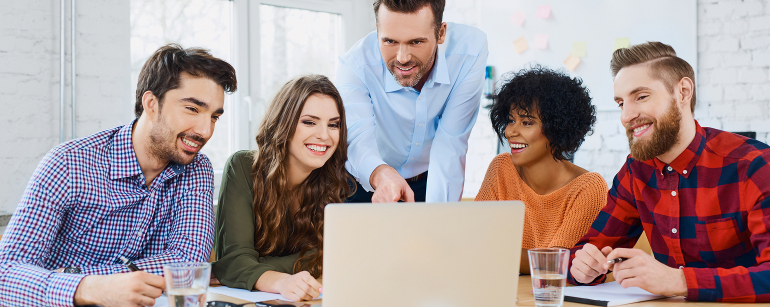 oworkers discussing new project on laptop