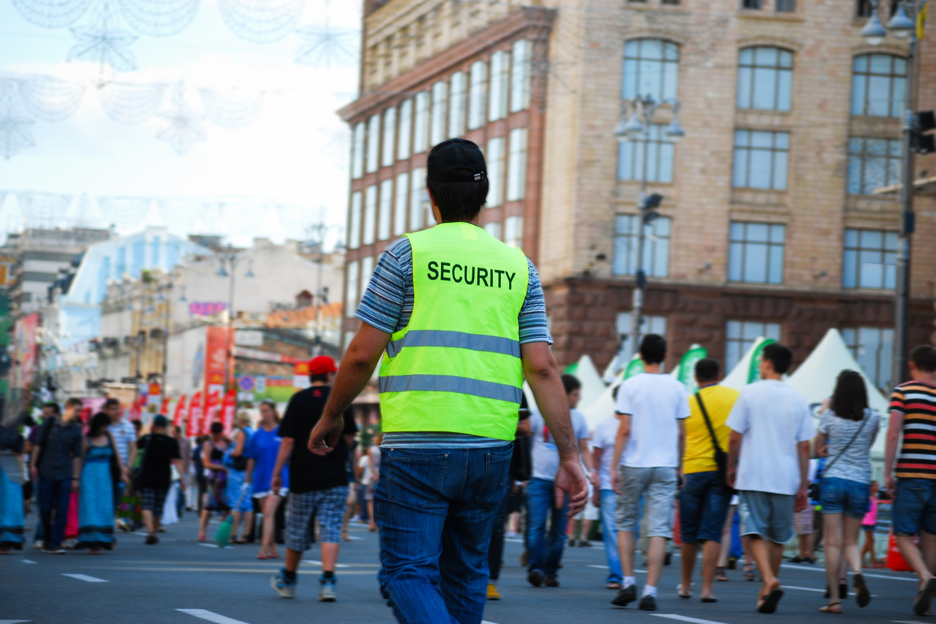 Security guard walking at outdoor public event