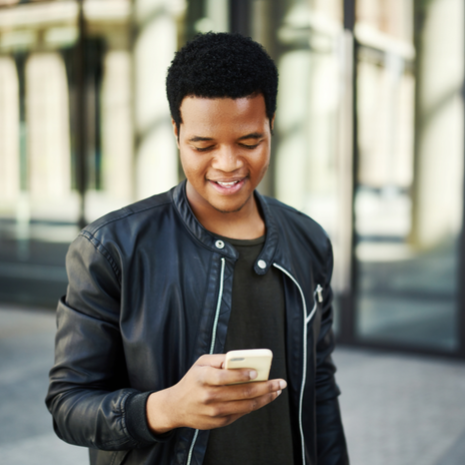 Image result for black person smiling using smartphone